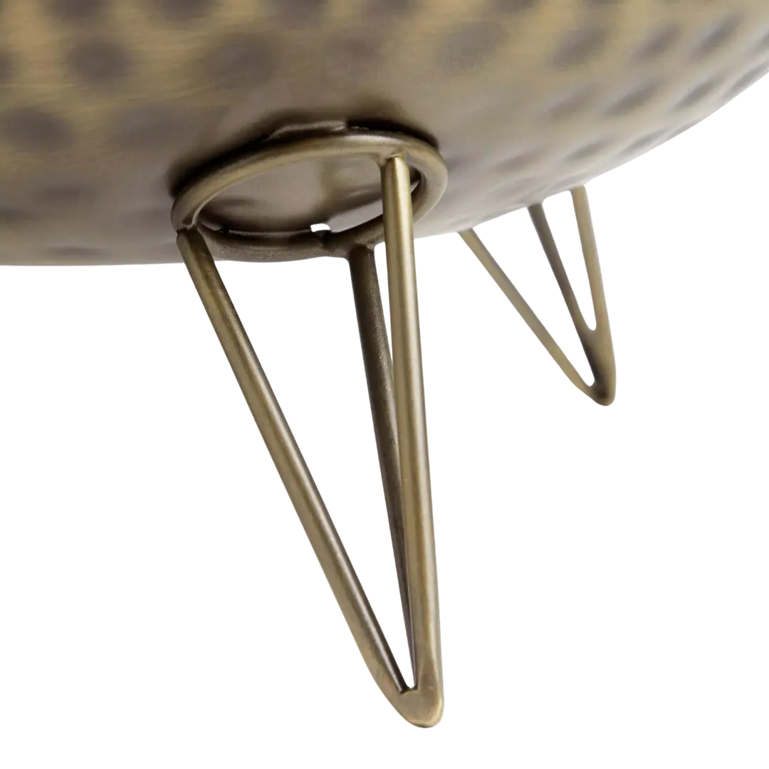 Hammered brass planting pots in living room setting